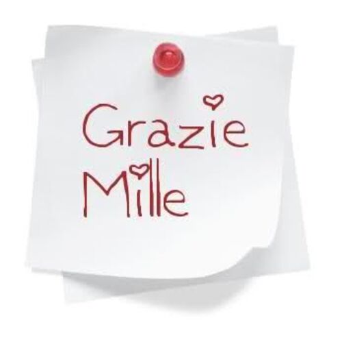 La frase "Grazie Mille" su un post it da condividere gratis